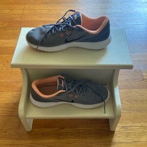 Gray and pink Nike flex tennis shoes